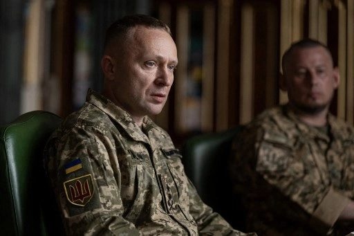 This handout photograph taken and released by the Ukrainian Presidential Press Service on July 20, 2026 shows Ukraine’s Joint Forces Commander Mykhailo Drapaty (L) during a meeting with Ukraine’s president in Kyiv.