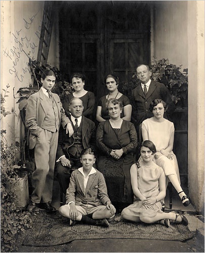 frida_kahlo_l_at_about_age_19_with_her_family_c._1927_.jpg