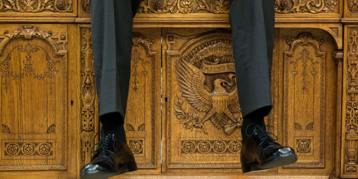 oct._1_2015_i_focused_on_the_detail_of_the_resolute_desk_as_the_president_was_talking_with_two_aides_in_the_oval_office._official_white_house_photo_by_pete_souza.jpeg